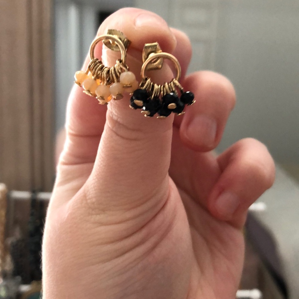 Two pairs of black and blush earrings
